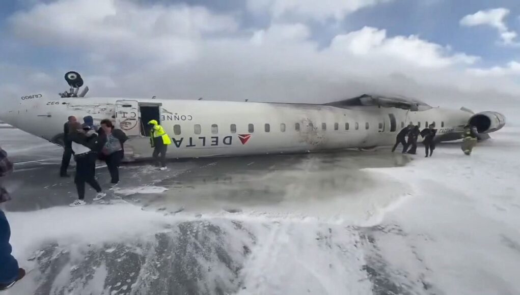 A plane with 80 people on board flips upside down at Toronto Airport, injuring 18.