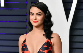 For the New York premiere of “Idiotka,” Camila Mendes wears a Chanel tank top and a sheer midi skirt. For the New York premiere of "Idiotka," Camila Mendes wears a Chanel tank top and a sheer midi skirt.