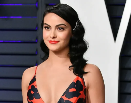 For the New York premiere of “Idiotka,” Camila Mendes wears a Chanel tank top and a sheer midi skirt. For the New York premiere of "Idiotka," Camila Mendes wears a Chanel tank top and a sheer midi skirt.