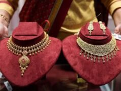 Gold climbs to three-month high as weaker dollar, Fed signals lift bullion