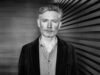 Interview | Director Kevin Macdonald on bringing his documentary instincts to ‘The Runner’ and capturing modern paranoias